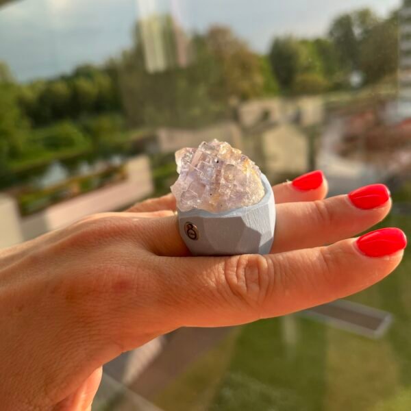 contemporary ring with natural fluorite on hand