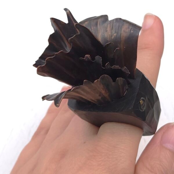 Bold designer ring with floral metal structure