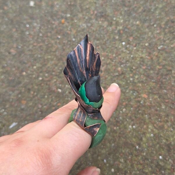 wearable-art-jewelry-on-hand