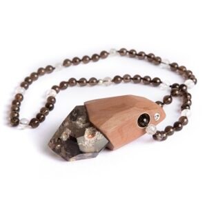 Smoky Quartz pendant necklace showing raw crystal texture.