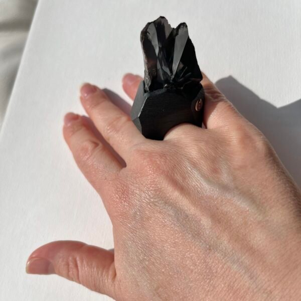 wearable art hematite gemstone ring on hand