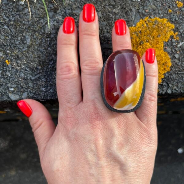 statement ring black and bright on hand
