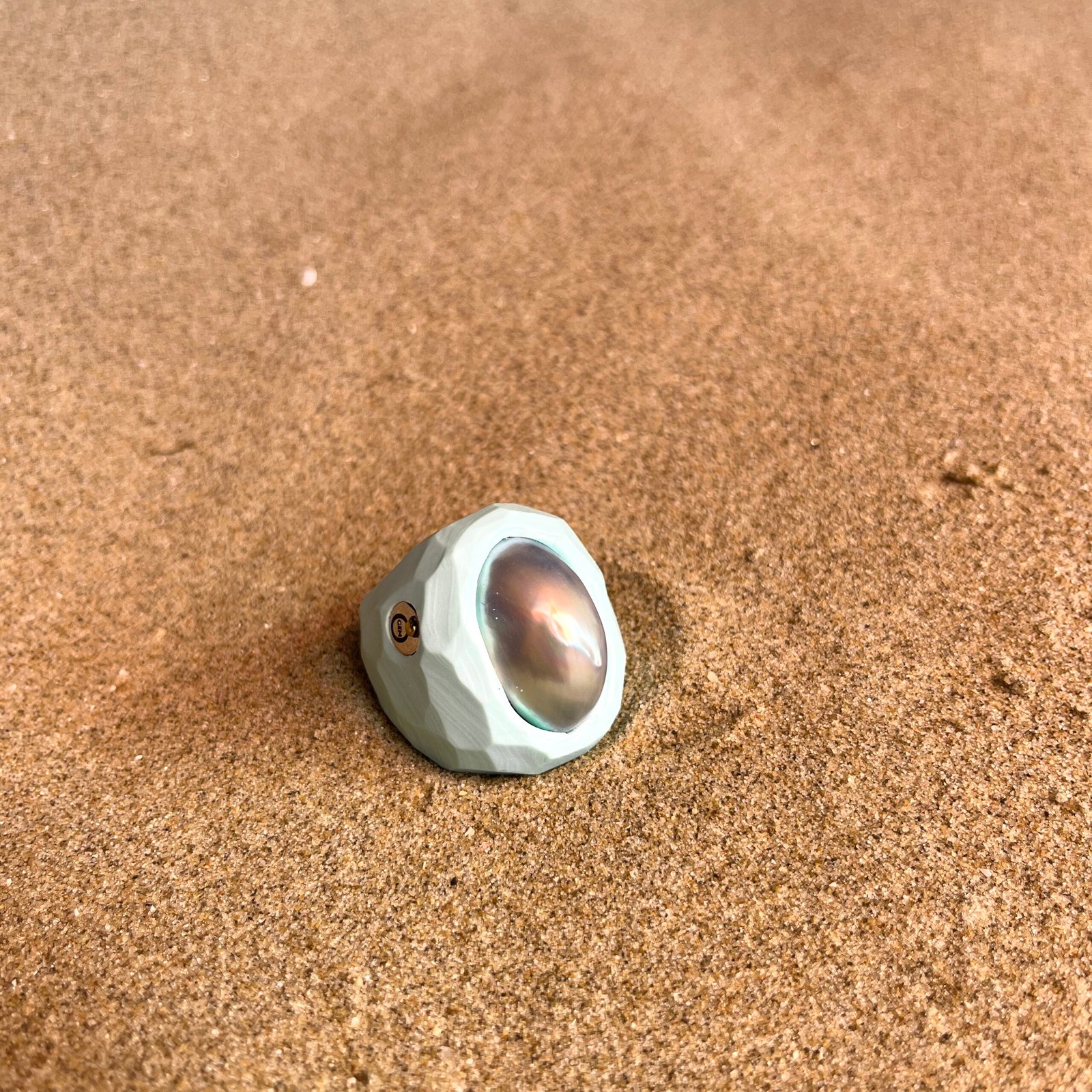 handmade ceramic ring with gray blue Mabe pearl